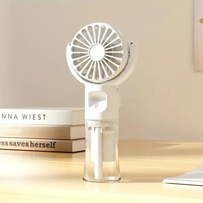 Portable hand-held spray fan with humidifier -4-speed adjustment, USB charging, suitable for desk or travel,