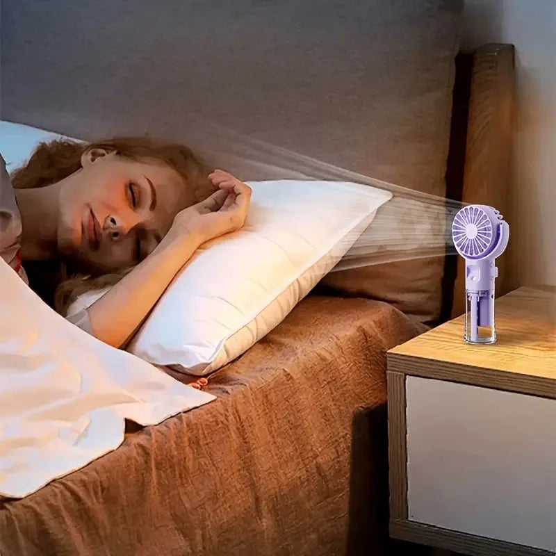Portable hand-held spray fan with humidifier -4-speed adjustment, USB charging, suitable for desk or travel,